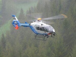 Hubschrauber der Polizei Rheinland-Pfalz in der Luft. - Foto: Polizei RLP
