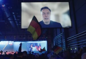 Elon Musk ließ sich am Samstag live auf den AfD-Parteitag zuschalten, lobte die AfD - und rief dazu auf, die Erinnerungskultur "hinter sich zu lassen." - Video: ZDF, Screenshot: gik