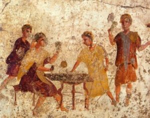 Römer beim Würfelspiel auf einem Wandgemälde in Pompeii. - Foto: IRM/Vahl 