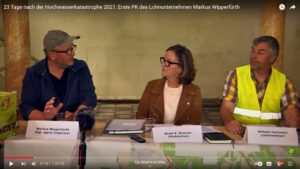 Pressekonferenz von Wipperfürth, Hartmann und anderen Helfern mit Beate E. Wimmer als Moderatorin. - Screenshot: gik