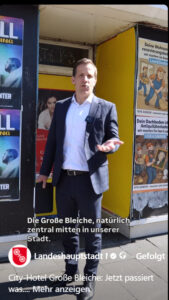 Kann Fortschritte am Neubrunnenhof in der Großen Bleiche verkünden: Oberbürgermeister Nino Haase (parteilos). - Video: Stadt Mainz, Screenshot: gik 