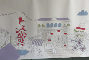 Die Schaufensterfolien sind von bunten Mainz-Motiven geziert. - Foto: gik 